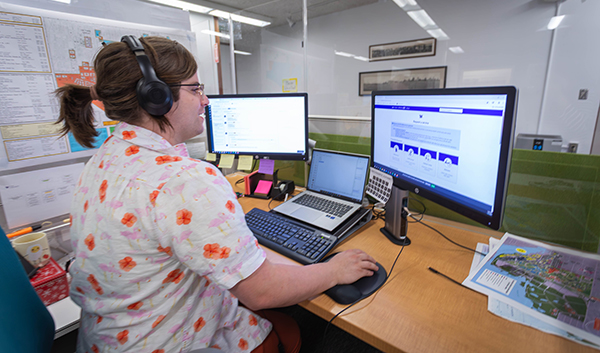 Customer Care Team member using new intake platform