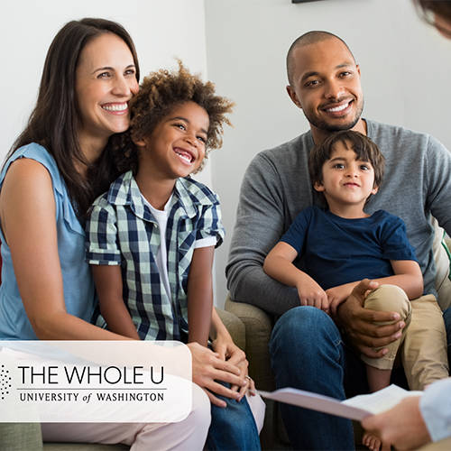 smiling family talking to someone