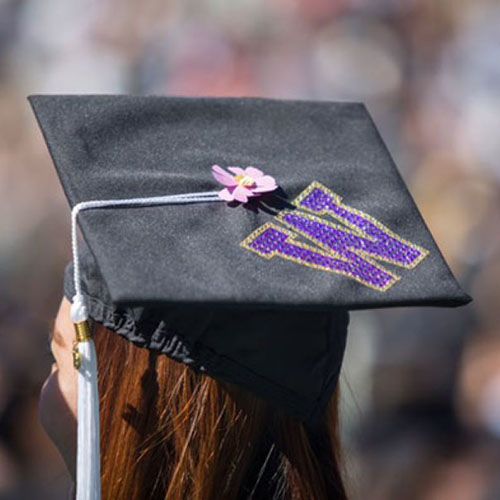 graduation cap with a purple W